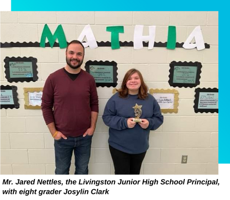 Principal and student stand with MATHia award